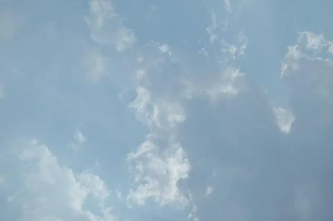 Blue sky with a cloud. Stock Photos