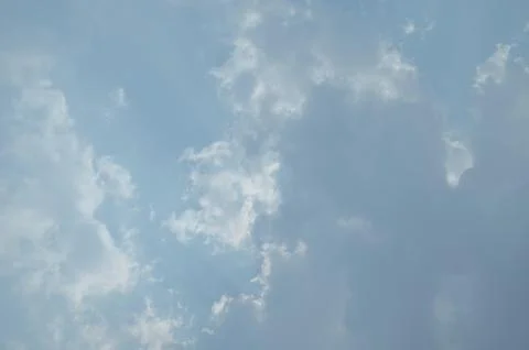 Blue sky with a cloud. Stock Photos