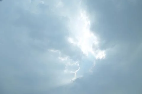 Blue sky with a cloud. Stock Photos