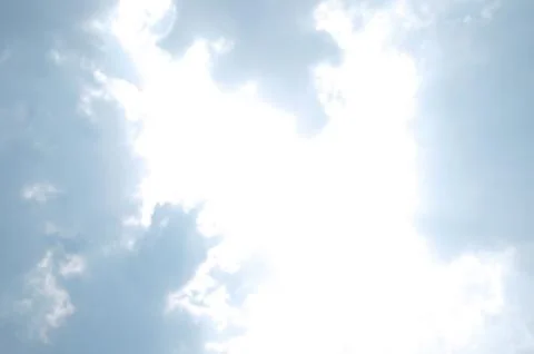 Blue sky with a cloud. Stock Photos
