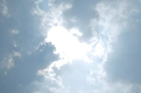 Blue sky with a cloud. Stock Photos