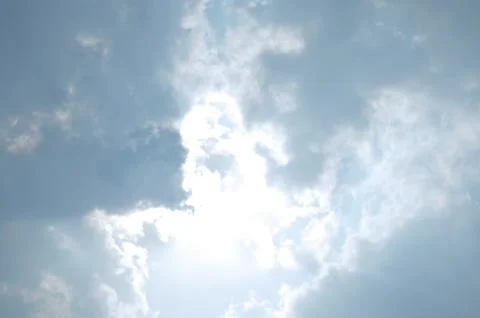 Blue sky with a cloud. Stock Photos