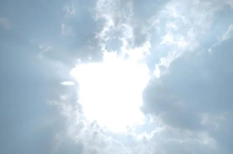 Blue sky with a cloud. Stock Photos