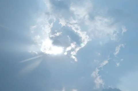Blue sky with a cloud. Stock Photos