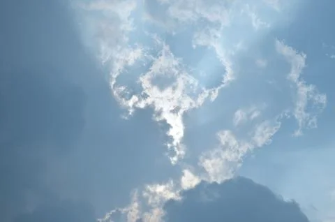 Blue sky with a cloud. Stock Photos