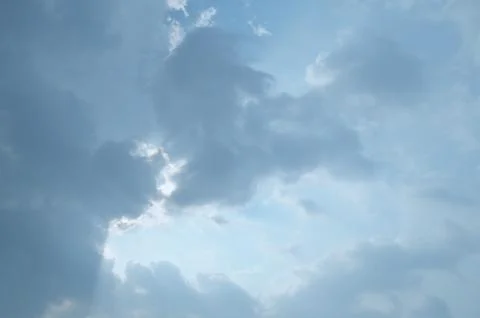 Blue sky with a cloud. Stock Photos