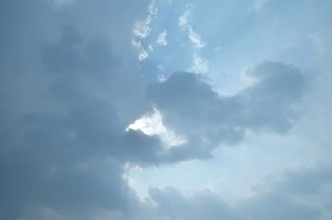 Blue sky with a cloud. Stock Photos