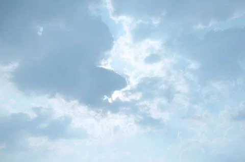 Blue sky with a cloud. Stock Photos