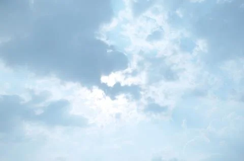 Blue sky with a cloud. Stock Photos