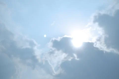 Blue sky with a cloud. Stock Photos