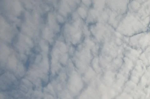 Blue sky with a cloud. Stock Photos