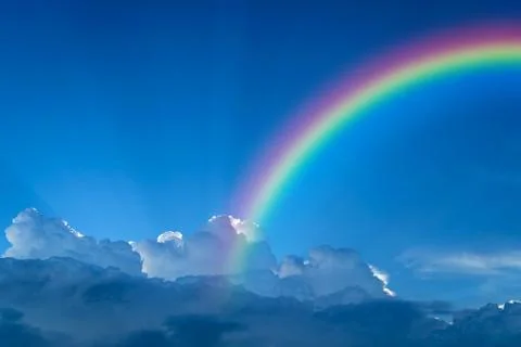 Blue sky cloud with rainbow Stock Photos
