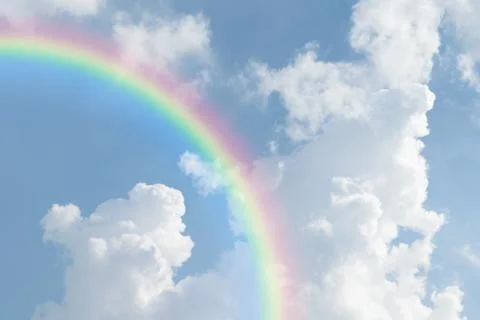 Blue sky cloud with rainbow Stock Photos