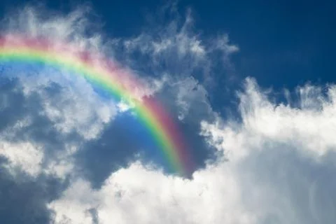 Blue sky cloud with rainbow Stock Photos