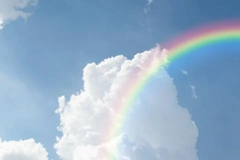 Blue sky cloud with rainbow Stock Photos