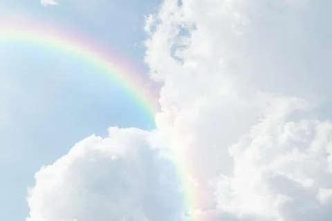 Blue sky cloud with rainbow Foto stock