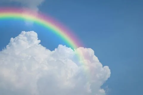 Blue sky cloud with rainbow Foto stock