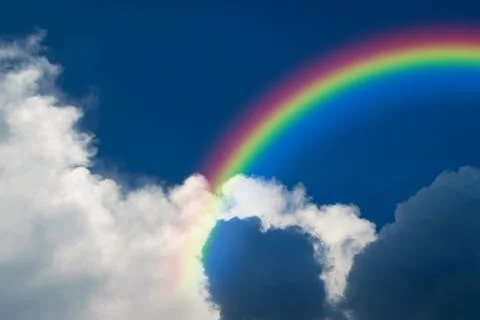 Blue sky cloud with rainbow Foto stock