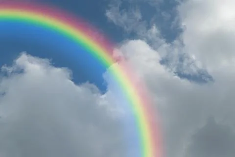 Blue sky cloud with rainbow Foto stock