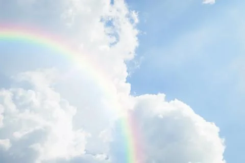 Blue sky cloud with rainbow Stock Photos