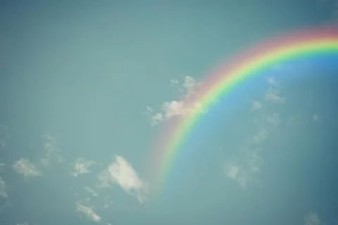 Blue sky cloud with rainbow , process in vintage style Foto stock