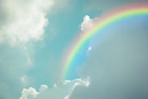 Blue sky cloud with rainbow , process in vintage style Stock Photos