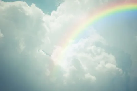 Blue sky cloud with rainbow , process in vintage style Foto stock
