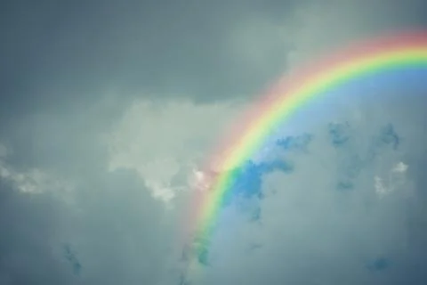 Blue sky cloud with rainbow , process in vintage style Stock Photos