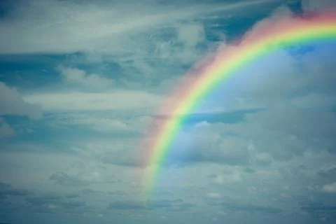 Blue sky cloud with rainbow , process in vintage style Stock Photos
