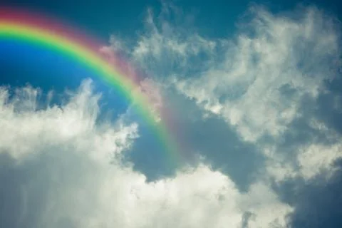 Blue sky cloud with rainbow , process in vintage style Stock Photos