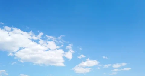 Blue sky with clouds 4K sun Time lapse clouds Stock Footage 128654423