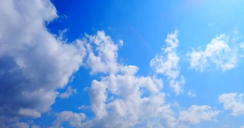 Blue sky with clouds 4K sun Time lapse clouds Stock Footage 128654468