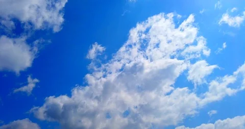 Blue sky with clouds 4K sun Time lapse clouds Stock Footage 128654492