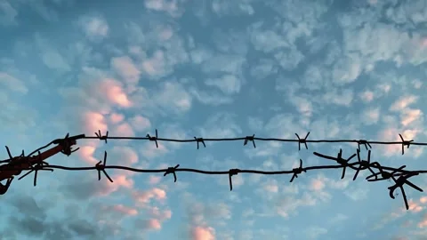 Blue Sky with Clouds and Barbed Wire. Video stock 133457401