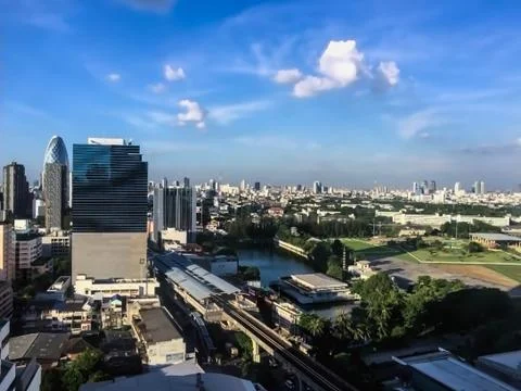 Blue sky clouds and building Stock Photos
