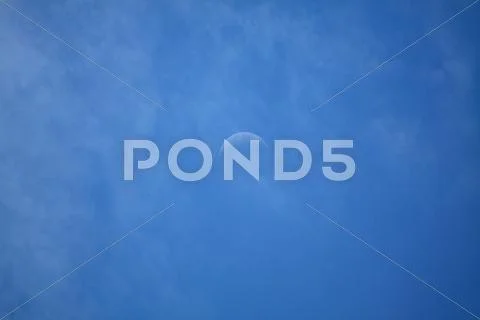 Blue sky with clouds and crescent Stock Photos