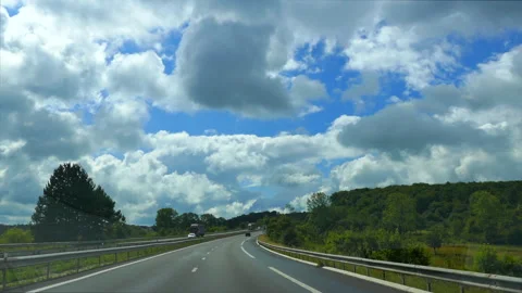 Blue Sky, Clouds, and the Highway Stock Footage 330615512