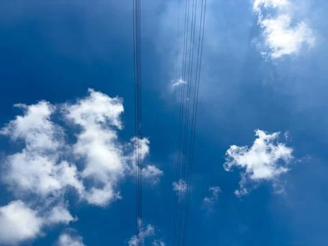 Blue Sky with Clouds and Power Lines, Aerial View, Electrical Grid, Weather Stock Photos