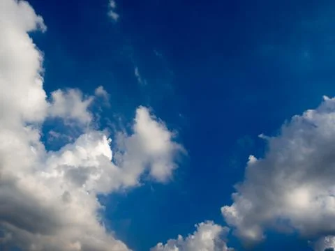 Blue sky with clouds and rain clouds before the storm coming Stock Photos