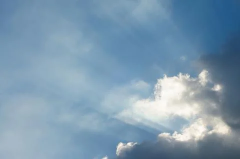 Blue Sky with Clouds and Rays Stock Photos
