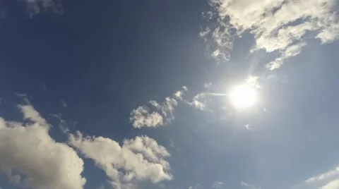Blue sky with clouds and sun Stock Footage 49132863