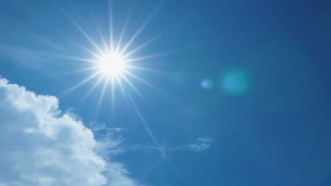 Blue sky with clouds and sun shines day with flares Stock Footage 142676413