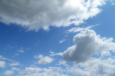 Blue sky with clouds and sun. Foto stock