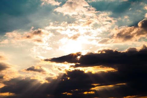 Blue sky with clouds and sun Stockfoto's