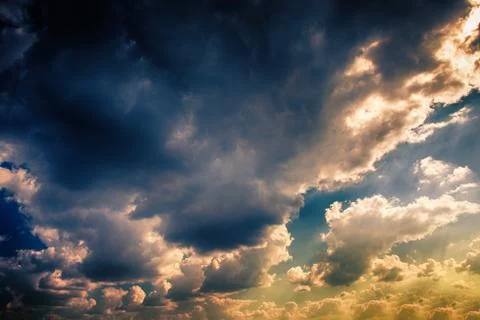Blue sky with clouds and sun Stock Photos