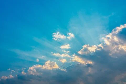 Blue sky with clouds and sun shines bright in the day Stock Photos