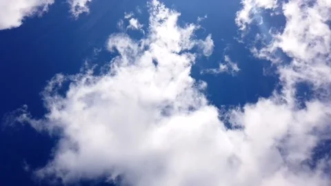 Blue sky with clouds and sunbeams time-lapse Video stock 130637080