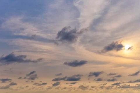 Blue sky with clouds and sunset. Use for background text or design Stock Photos