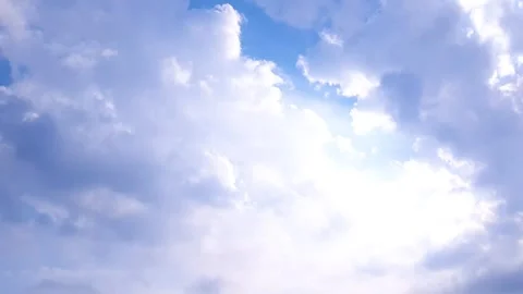 Blue sky with clouds and sunshine. Sky landscape on the horizon with clouds. Stock Footage 308631292