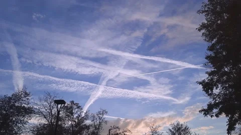 Blue sky with clouds and trail from plane. Stock Footage 237631990